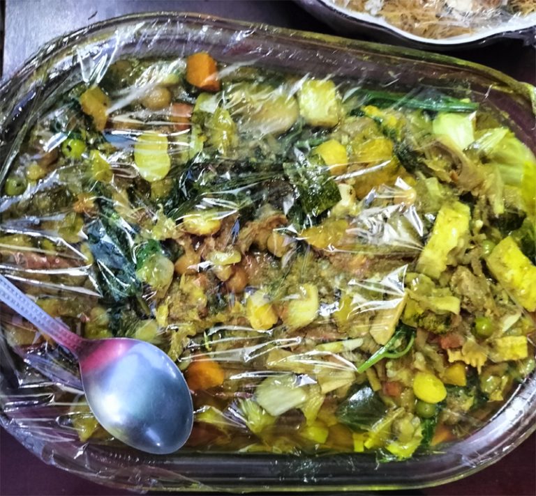 দীঘিনালায় বিঝু মেলাতে জনপ্রিয় পাজন তরকারির সুস্বাদু খাবার